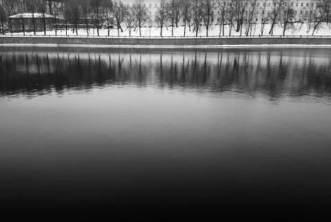 Dramatic black and white river reflections city background 스톡 사진