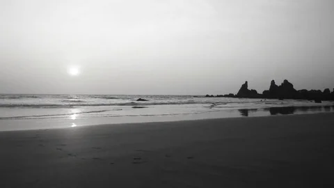 Dramatic black and white sunset on beach  Stock Footage 89868595