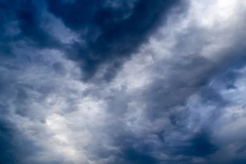 Dramatic black cloud and rainy Stock Photos