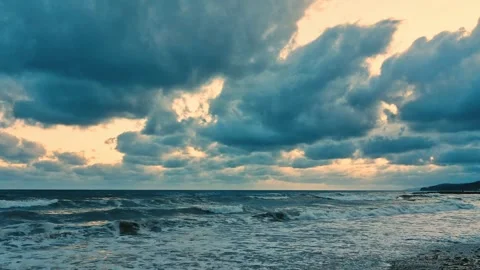 Dramatic Black Dark Gray Rain Cumulus Clouds in Yellow Sky Over Ocean, Tropical Stock Footage 284126500