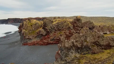Dramatic Black Sand Beach and Volcanic Rock Formations in Iceland Stock Footage 320228922