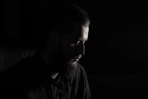 Dramatic black &amp; white man portrait bearded face calm emotion Stock Photos