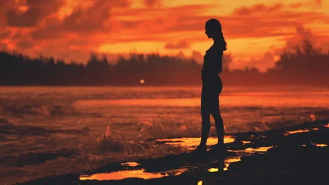Dramatic bloody red sunset over ocean shore beach. Stock Footage 260468724