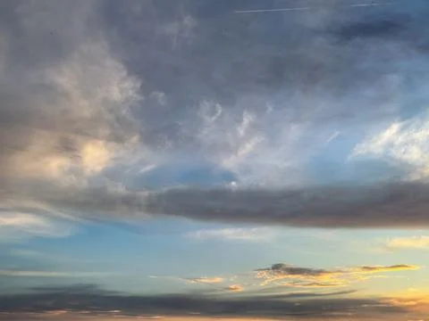 Dramatic Blue Sky With Airplane Contrail Stock Photos