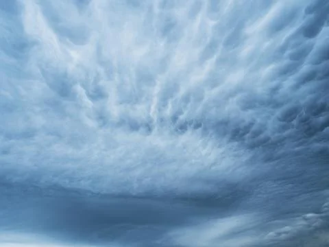Dramatic blue sky with clouds. Spooky abstract background. Foto stock