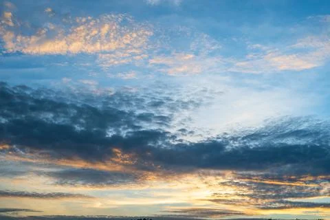 Dramatic blue sky with clouds on sunset Stock Photos