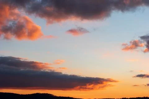 Dramatic blue sky during sunset blue pink and dark violet clouds Fotos de archivo