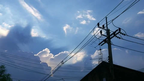Dramatic blue sky with electric power lines Stock Footage 318959350