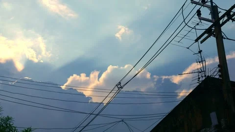 Dramatic blue sky with electric power lines Stock Footage 324805363