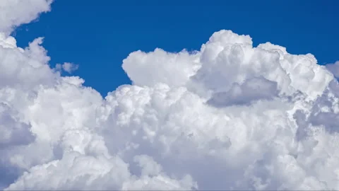 Dramatic Boiling Cumulonimbus Clouds Growing in Blue Sky Stock Footage 338433585
