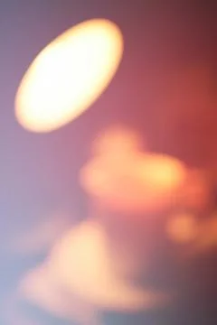 Dramatic bokeh of lamp and cup of tea background Stock Photos