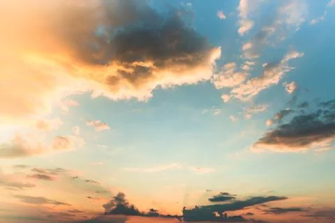 Dramatic bright colorful sunset with multicolor clouds Stock Photos