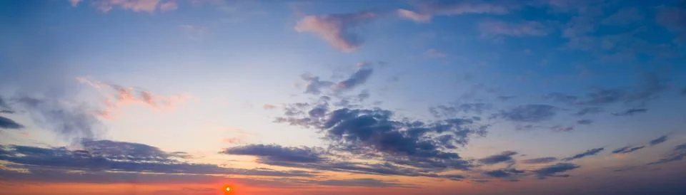 Dramatic bright saturated cloudy sunset or sunrise Fotos de archivo