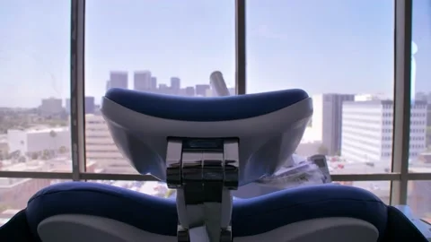 Dramatic camera movement looking at a dental chair and equipment Stock Footage 203065715