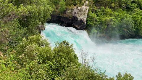 Dramatic canyon rapids of Huka Falls on Waikato River New Zealand Stock Footage 302716774