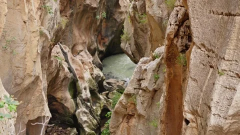 Dramatic canyon view with rushing river during daylight 스톡 동영상 307600541