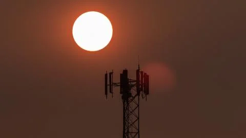 Dramatic Cell Tower Sunrise. Stock Photos