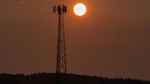 Dramatic Cell Tower Sunrise Time-lapse. Stock Photos