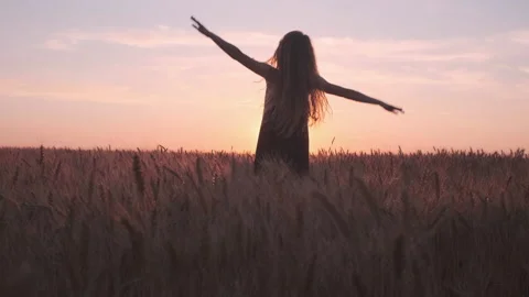 Dramatic choreography dance on the wheat field in sunset light Stock Footage 200876724