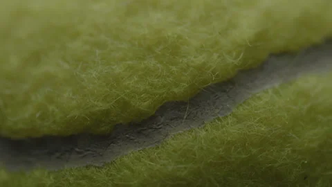 Dramatic, cinematic macro texture shots of a tennis ball Stock Footage 266190012