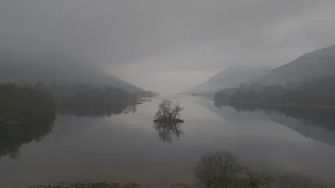 Dramatic Cinematic Scottish Loch in the rain (ungraded) Stock Footage 304806258