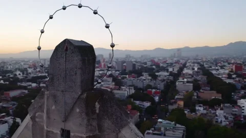 Dramatic cinematic wide drone shots of massive Jesus status towering over 스톡 동영상 231454656
