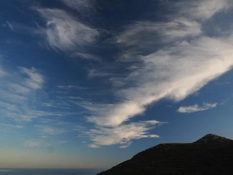 Dramatic Cirrus Cloudscape at Dusk over Kea Island, Cyclades, Aegean Sea, Greece Stock Photos