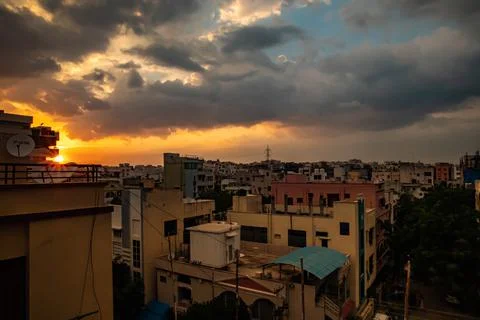 Dramatic city clouds Stock Photos
