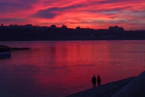 Dramatic City Landscape Sunset Violet sky Couple Stock Photos