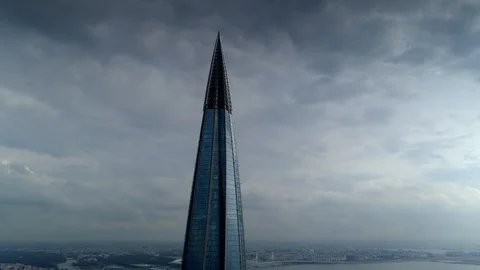 Dramatic cityscape clouds skyscraper Petersburg Russia epic attraction Aerial 4k Video stock 128621032