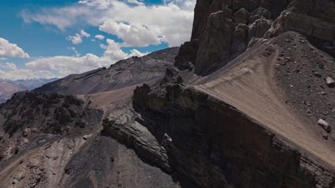 Dramatic Cliff Edge in Dry Mountain Range Aerial View Stock Footage 311351302