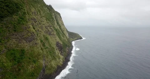 DRAMATIC CLIFFS AND OCEAN ARIAL Stock Footage 127885785