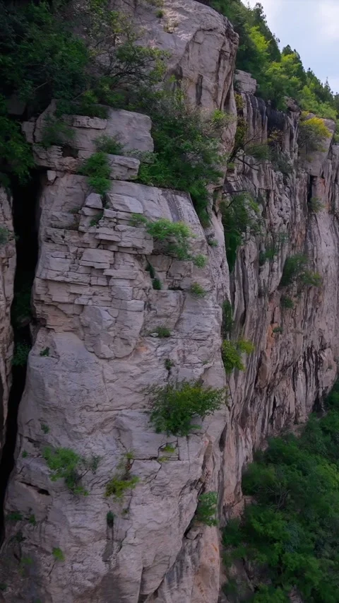 Dramatic Cliffs and Verdant Forest of Fohui Mountain, China Stock Footage 331148102