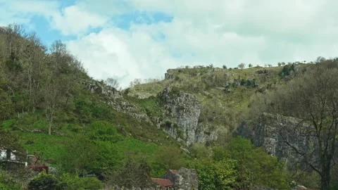 Dramatic cliffs at Cheddar Gorge, Cheddar, Somerset, England Stock Footage 332669140