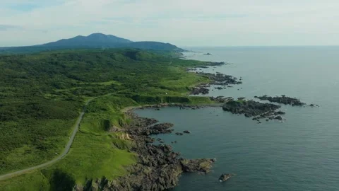 Dramatic Cliffs With Grassy Plains In Cape Nyudozaki (Cape Nyudo) On The Oga Stock Footage 337051909