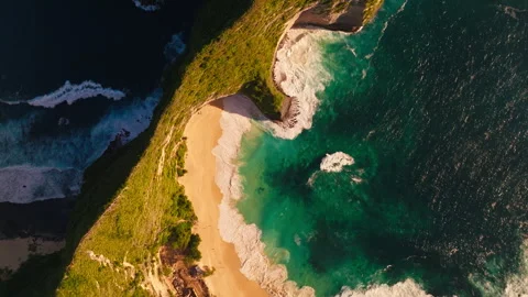 Dramatic Cliffs of Kelingking Beach at Golden Hour – Aerial View Stock Footage 317203741