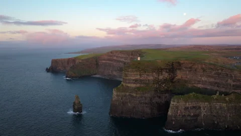 Dramatic Cliffs of Moher at Sunset with Pink Sky in Ireland Stock Footage 331828246