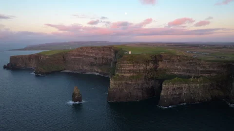 Dramatic Cliffs of Moher at Sunset with Pink Sky in Ireland Stock Footage 331828441