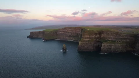 Dramatic Cliffs of Moher at Sunset with Pink Sky in Ireland Stock Footage 331828598
