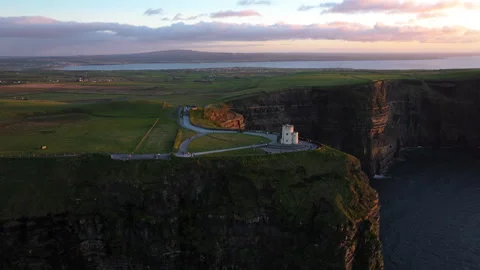 Dramatic Cliffs of Moher at Sunset with Pink Sky in Ireland Stock Footage 331828733