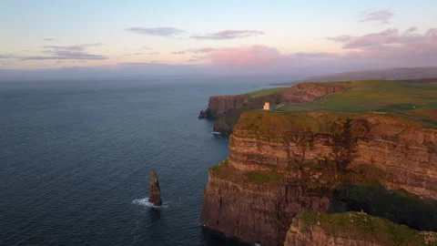 Dramatic Cliffs of Moher at Sunset with Pink Sky in Ireland Stock Footage 331828838