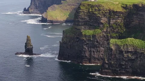 Dramatic Cliffs of Moher Towering Over Atlantic Coastline in County Clare Stock Footage 339378360