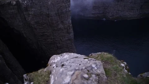 Dramatic Cliffs Overlooking the Ocean in Faroe Islands Stock Footage 306042886