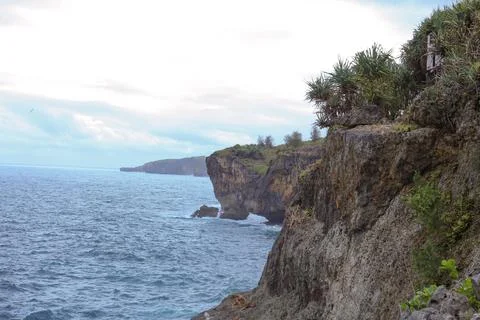 Dramatic Cliffside Ocean View at Sunset Stock Photos