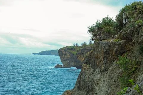 Dramatic Cliffside Ocean View at Sunset Stock Photos