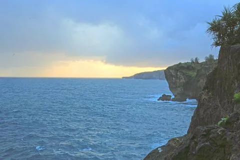 Dramatic Cliffside Ocean View at Sunset Stock Photos
