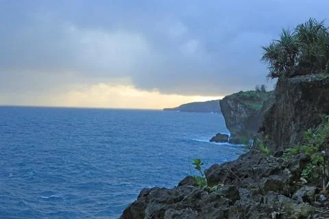 Dramatic Cliffside Ocean View at Sunset Stock Photos