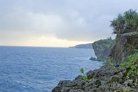 Dramatic Cliffside Ocean View at Sunset Stock Photos