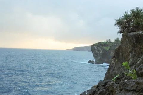 Dramatic Cliffside Ocean View at Sunset Stock Photos