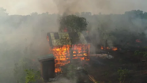 Dramatic Close Aerial of Burning House, Peat Fire, Indonesia Video stock 142510932